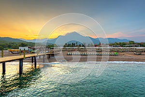 Amazing sunset on the coast of Turkish Riviera with Mount Tahtali in background, Tekirova photo