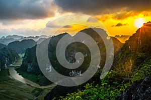 Amazing sunset landscape viewpoint from the top of Mua Cave mountain, Ninh Binh, Tam Coc, Vietnam