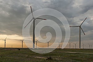 Sunset landscape with Wind turbines near Kaliakra Cape at Black Sea Coast, Dobrich Region, Bulgaria