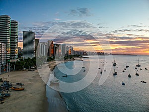 Amazing sunset in Mucuripe Beach. Fortaleza Ceara, Brazil photo