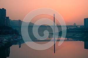 Amazing sunset over a bridge and river