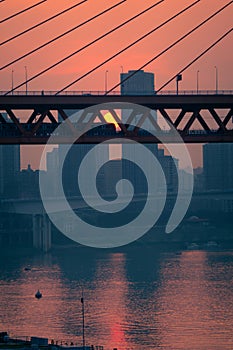 Amazing Sunset over bridge with train and car together