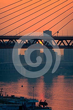 Amazing Sunset over bridge with train and human together