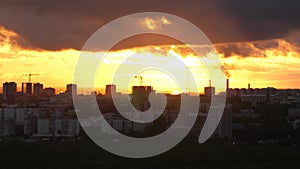 Amazing sunset over city, close up on modern downtown Novosibirsk skyline buildings. 3840x2160