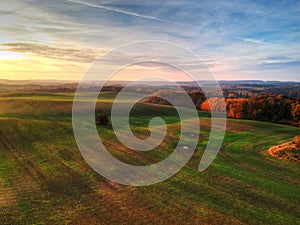 Amazing sunset over the green field, Poland