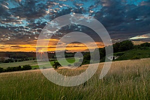 An amazing sunset over the Jeker valley in Maastricht with a dramatic sky