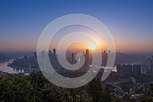 Amazing Sunset over Skyscrapers of Chongqing City