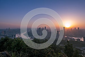 Amazing Sunset over Skyscrapers of Chongqing City photo