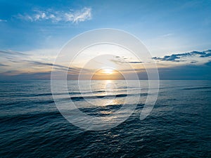 Amazing sunset or sunrise sky over sea landscape,Beautiful colorful light of nature seascape background,Drone aerial view ocean