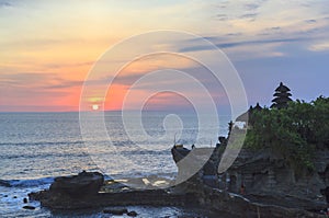 Amazing sunset at Tanah Lot temple in Bali Island