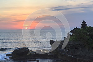 Amazing sunset at Tanah Lot temple in Bali Island