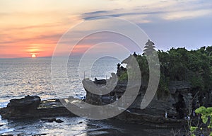 Amazing sunset at Tanah Lot temple in Bali Island