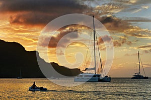 Amazing sunset view. Sailing boat on Bequia island in Saint Vincent and the Grenadines.