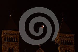 Amazing Super Blood Wolf Moon above a church
