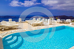 Amazing swimmingpool with caldera view in Imerovigli village, Santorini photo