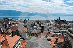 Amazing top view of the city Lausanne and the lake and hills made from the top of the cathedral, Switzerland