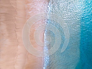 Amazing Top view sea beach landscape background,Summer sea waves crashing on sandy shore seascape background,High angle view ocean