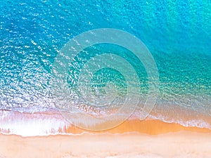 Amazing Top view sea beach landscape background,Summer sea waves crashing on sandy shore seascape background,High angle view ocean