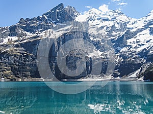 Amazing tourquise Oeschinnensee with Swiss Alps Kandersteg