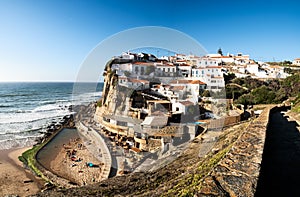 Town on a sun-drenched cliff near Colares photo