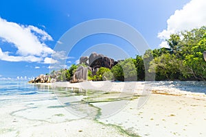 Amazing tropical beach Anse Source d`Argent with granite boulders on La Digue Island, Seychelles