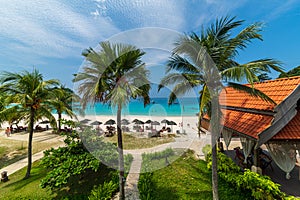 Amazing tropical private laguna resort wih white sand beach under a pure blue sky