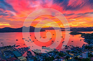 Amazing tropical sunset at the sea at Coron island, Busuanga, Philippines. Sea aerial view.