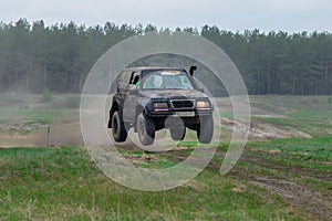 Amazing UTV driving in mud at Autumn day