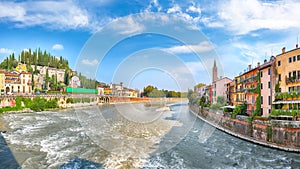 Amazing Verona cityscape view on the riverside with historical buildings ,bridges and tower