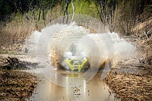 Amazing view of active ATV and UTV driving in mud water