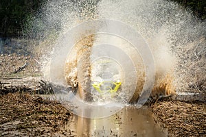 Amazing view of active ATV and UTV driving in mud water