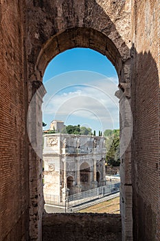 Amazing view of the Arch of Constantine framed from Colisseums arch windows