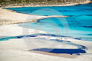 Amazing view of Balos Lagoon with magical turquoise waters, lagoons, tropical beaches of pure white sand and Gramvousa island on C