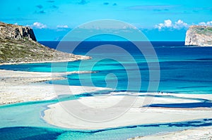 Amazing view of Balos Lagoon with magical turquoise waters, lagoons, tropical beaches of pure white sand and Gramvousa island on C