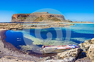 Amazing view of Balos Lagoon with magical turquoise waters, lagoons, tropical beaches of pure white sand and Gramvousa island on C