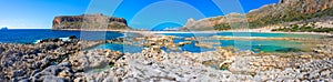 Amazing view of Balos Lagoon with magical turquoise waters, lagoons, tropical beaches of pure white sand and Gramvousa island on C