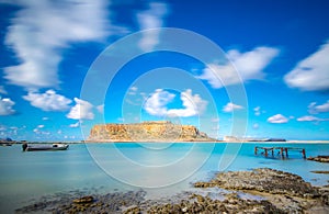 Amazing view of Balos Lagoon with magical turquoise waters, lagoons, tropical beaches of pure white sand and Gramvousa island.