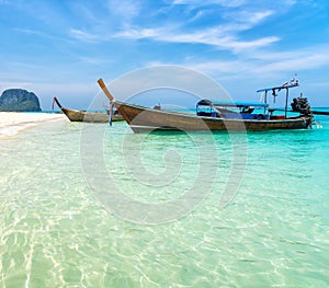 Amazing view of beautiful beach with traditional thailand longtale boat. Location: Bamboo island, Krabi province, Thailand,