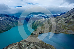Amazing view of the Besseggen  ridge, famous hiking spot in Jotunheimen National Park, admiring two glacial lakes with different
