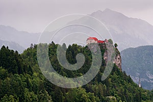 Amazing view on Bled lake, Bled castle at sunrise with mountain Triglav in background. Slovenia, Europe