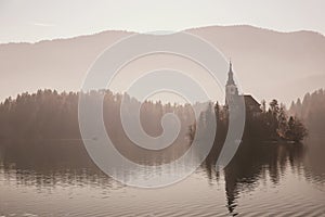 Amazing view on Bled Lake in fog, Slovenia.