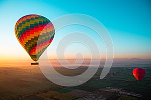 Amazing view of a bright vibrant baloon at sunrise. Balloon rides in luxor, view of egypt. Famous in cappadoccia as well, thrill