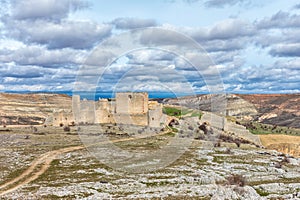 Amazing view of the Castle of Caracena on cloudy sky background photo