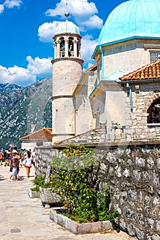 Amazing view of the church with a blue bath on the island of the Virgin on a reef in the Bay of Kotor