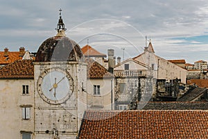 Amazing view of the clock tower and roofs in Trogir old town