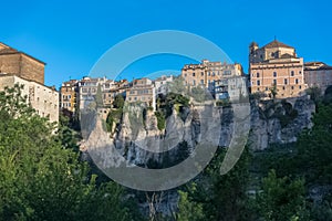 Amazing view at the Cuenca Hanging Houses, Casas Colgadas, and San Pedro church tower, iconic architecture, houses on cliffs