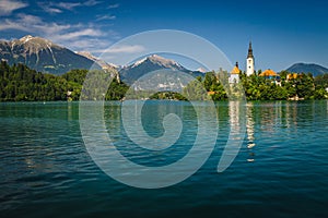 Amazing view with famous chuch on the green island, Slovenia