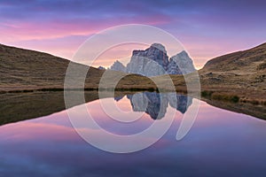 Amazing view of famous Dolomite peaks glowing in beautiful golden evening light at sunset in summer. Trentino Alto Adige,Dolomites