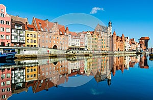Amazing view of Gdansk old town over Motlawa river with beautiful reflection in the water. Gdansk, Poland, Europe. Artistic
