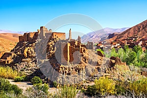 Amazing view of a Kasbah`s ruin on the way to Kasbah Ait Ben Haddou near Ouarzazate in the Atlas Mountains of Morocco. Artistic